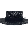 An angle view of Saunter Black Straw Sun Hat 