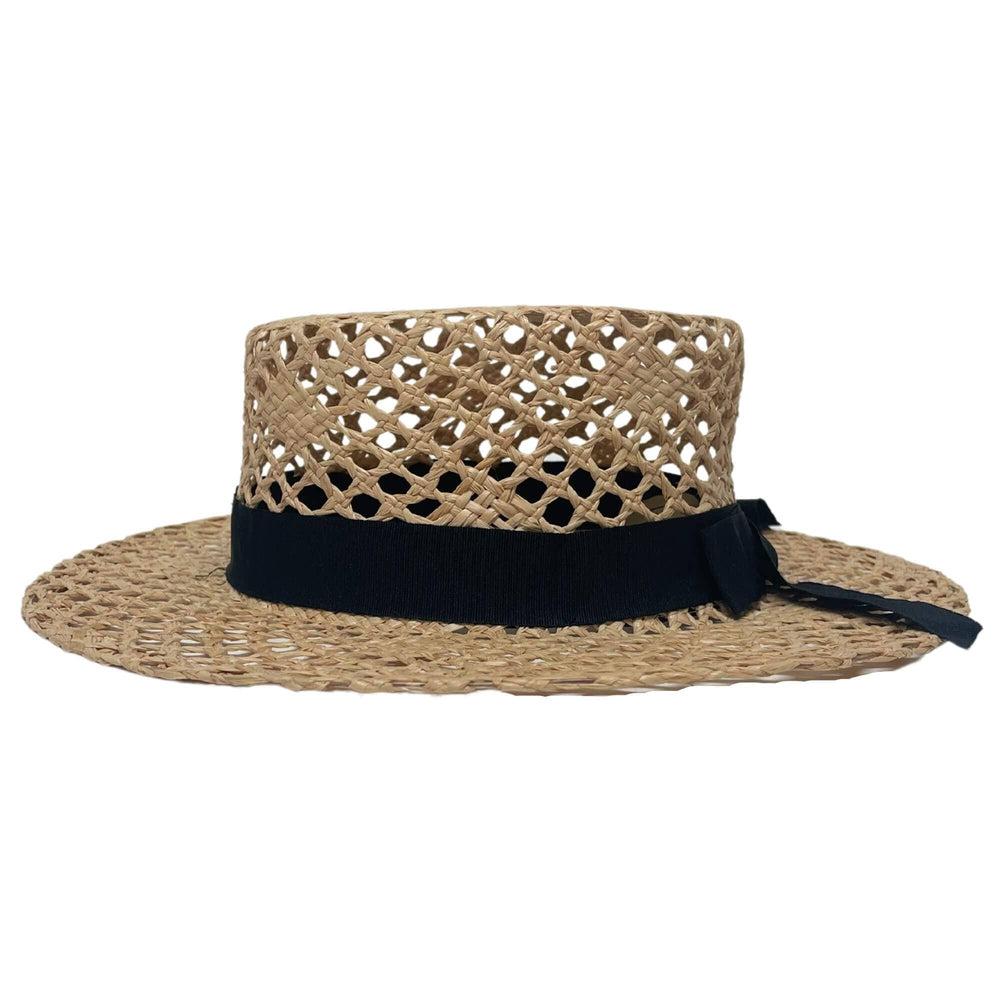 A side view of Saunter Natural Straw Sun Hat by American Hat Makers