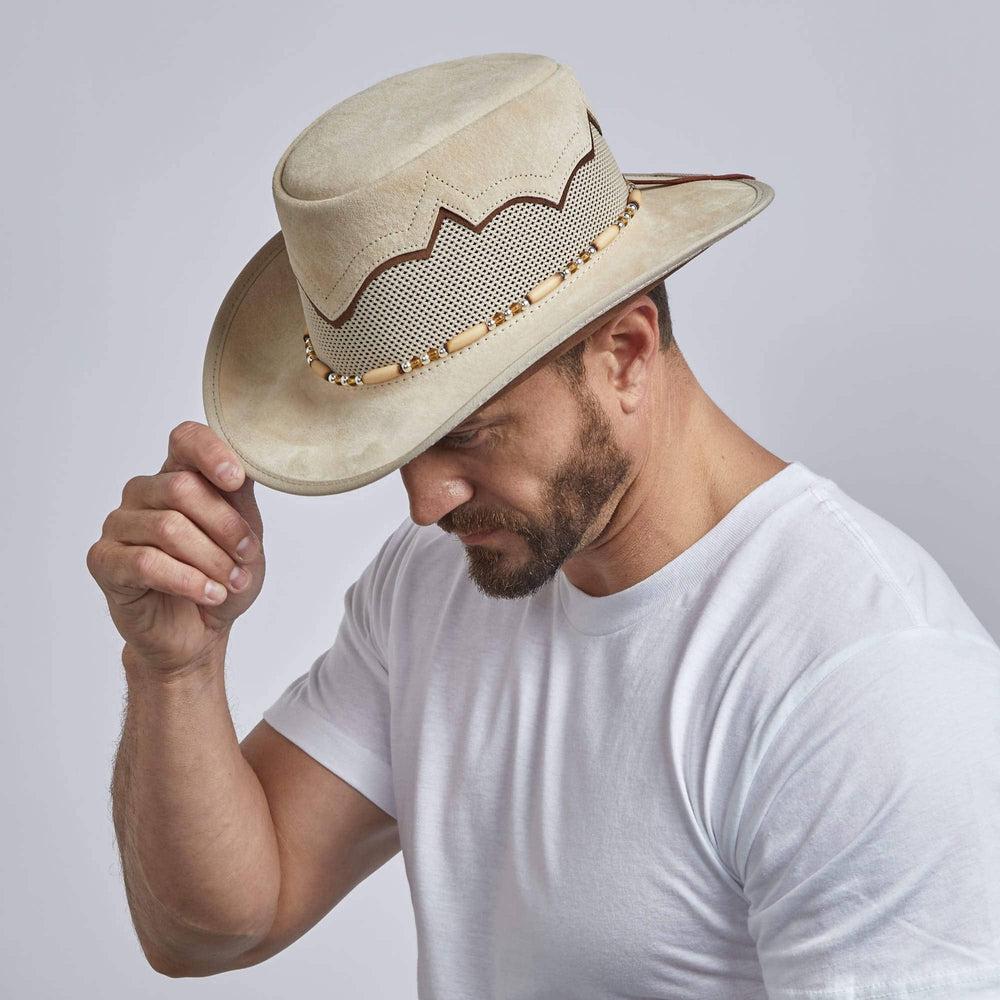 A man looking downward side wearing Sierra Latte Leather Mesh Cowboy Hat Crown 