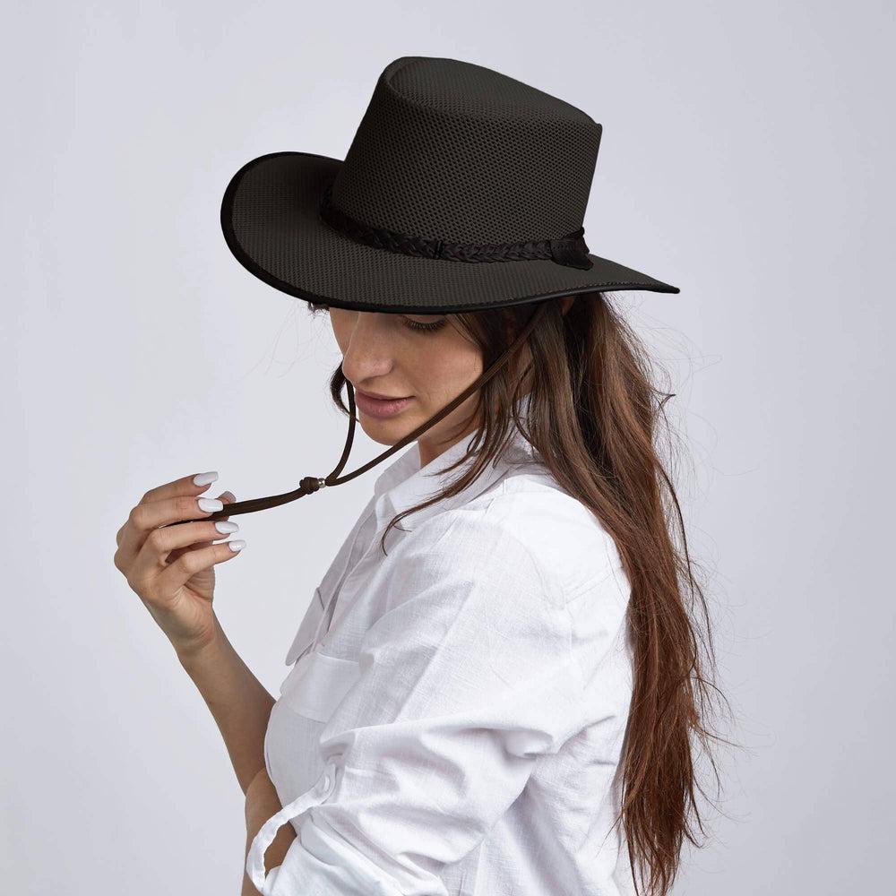 A woman wearing Soaker Black Mesh Sun Hat on an angle view