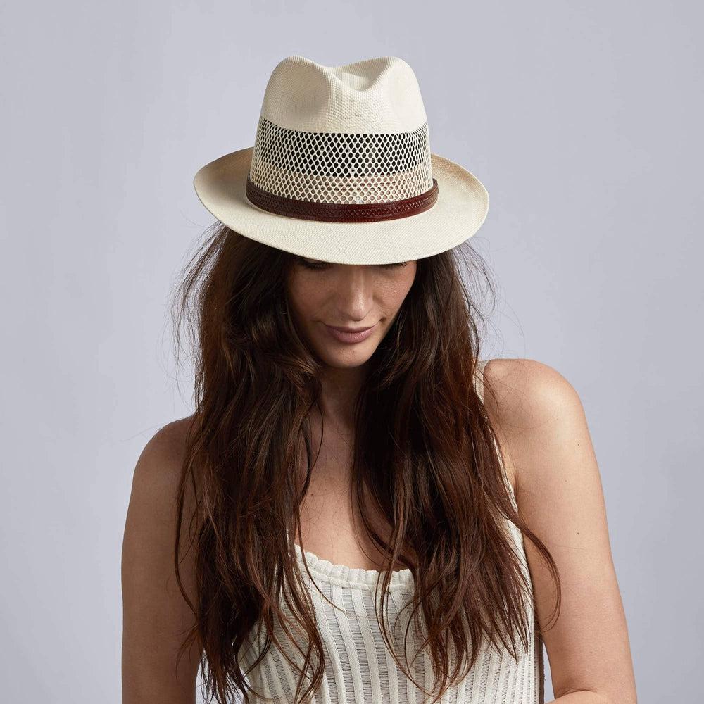 A woman wearing Tuscany Cream Straw Fedora Hat 