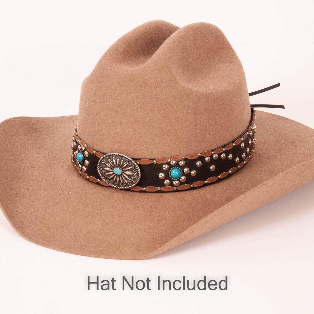 A dallas designed black hat band on a brown felt hat