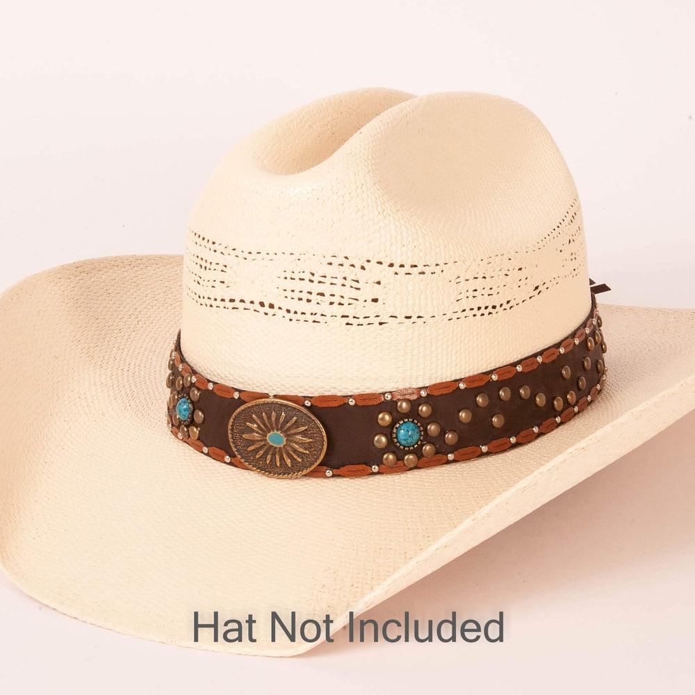 A dallas designed brown hat band on a white hat