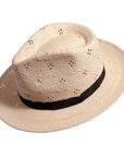 An side view of a cream Dimitri  fedora straw hat