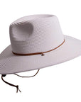 A side view of Felix white straw sun hat with chinstrap 