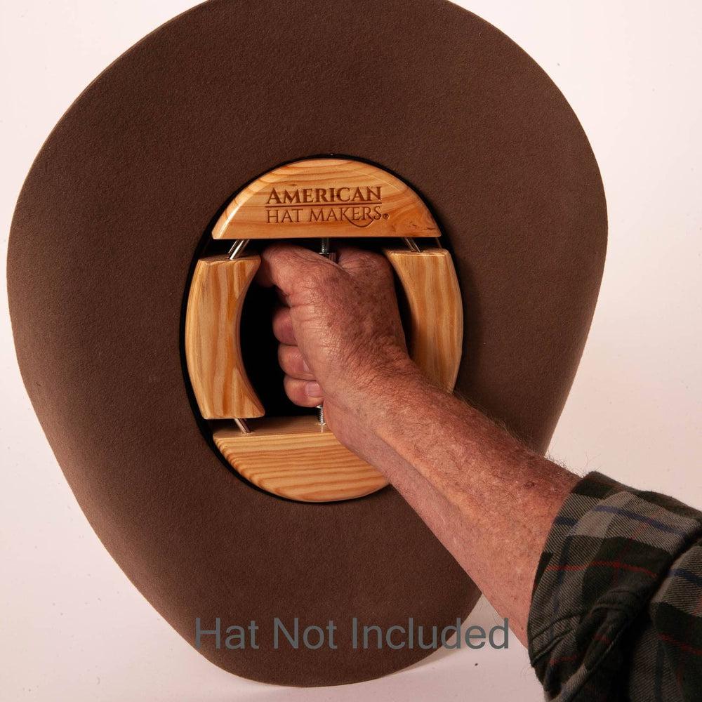 Four Way Hat Stretcher on a brown felt hat