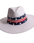 A back view of Knox white straw sun hat 
