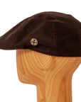 A side view of a Model C Black Cotton Cap 