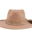 A front view of a cream cowboy hat