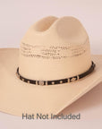 Rawlins Black Hat Band on a cream hat