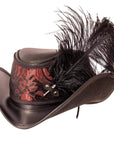 An angle view of a Reversible Ren Black & Red Leather Hat with a feather