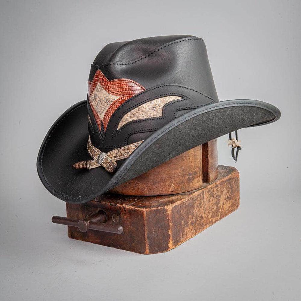 A Black Finished Storm Cowboy Hat with Double Rattle Band on a stand
